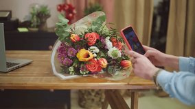 
Female florist photographs a colorful bouquet of flowers with a smartphone in a flower shop. - Powered by Shutterstock - Get 15% off with code: PIKWIZARD15