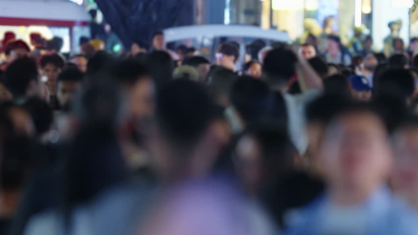 Lots of people walk city street. Crowded busy urban road rush hour. Many pedestrians stroll downtown. Chinese asian men going. China life day. Overcrowded roadway. Huge big mob. Large public group.