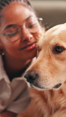 Woman, golden retriever and kiss with love in home, talking and hug for connection, care or trust in lounge. African girl, animal or pet dog with kindness, loyalty and happy in living room at house