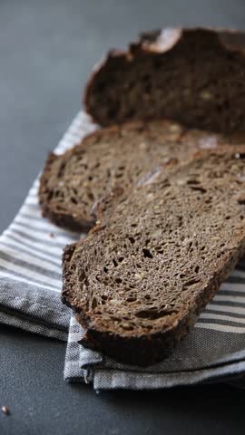 Black bread cereal whole grain bakery bun dish fresh gourmet food background on table rustic food top view copy space