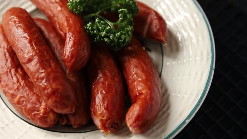 Sausages pork smoked meat beef dish fresh gourmet food background on table rustic food top view copy space