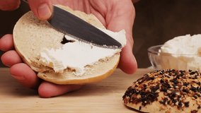 Bagel sandwich brunch, lunch plate of a bagel with smoked salmon and cream cheese and ham, close up morning cafe menu. - Powered by Shutterstock - Get 15% off with code: PIKWIZARD15