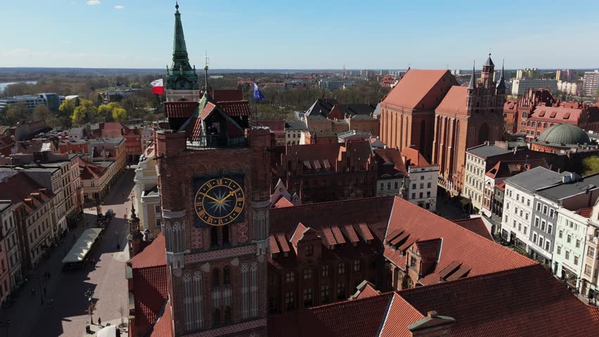 Aerial view on sunny day of historical tourist center of medieval city Torun, old town, churches, cathedrals and Vistula river, Poland, Europe