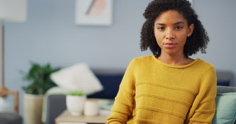 Stop, hand and face of woman in a house with gesture for voice, security or domestic violence warning. Protest, palm or portrait of female person in living room with emoji sign for no, vote or danger