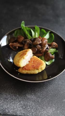 Meat cutlet Cordon Bleu chicken, ham, cheese appetizer dish fresh gourmet food background on the table rustic food top view copy space