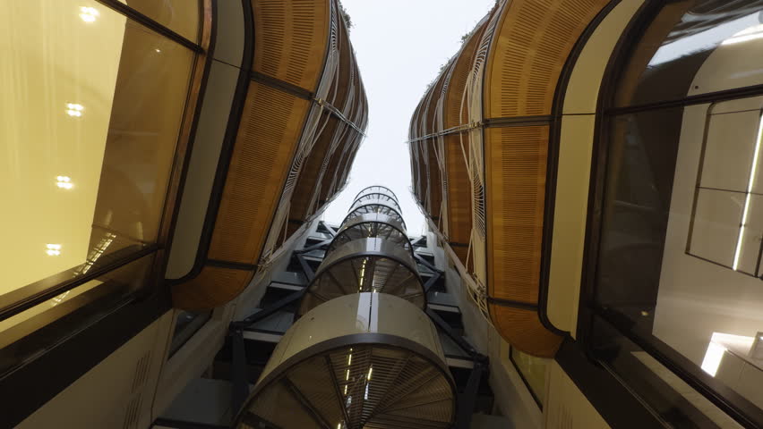 Modern architecture spiral staircase reaching for the sky. Action
