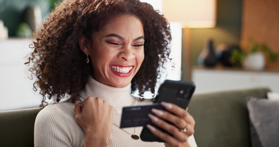 Woman, home and smile on smartphone with credit card for online shopping, discount and sale. Female person, living room and sofa with smile on mobile app or banking with rewards, voucher and savings