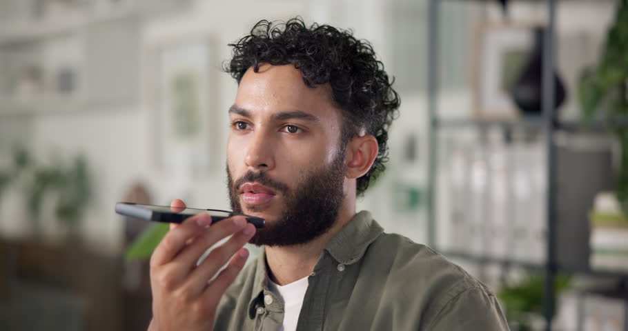 Man, voice note and talk in office with discussion for project management at web design company. Person, smartphone and recording with agreement, review and feedback negotiation at creative agency