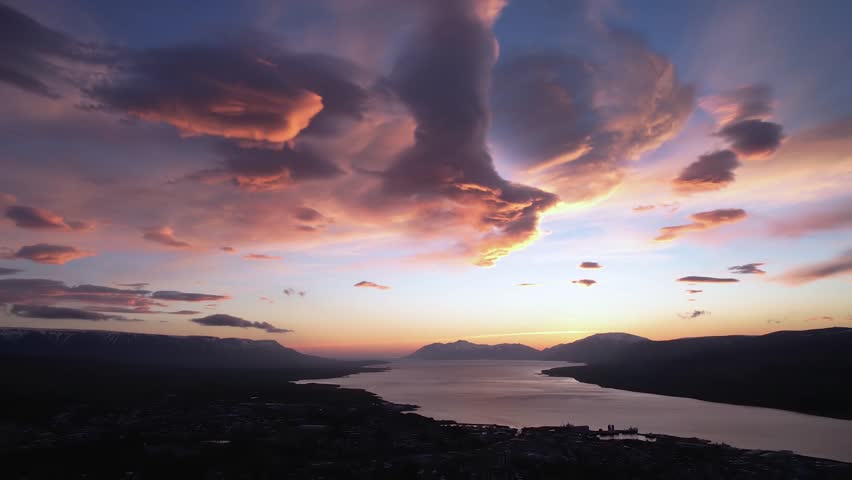 Dramatic Sunset over River Valley Landscape