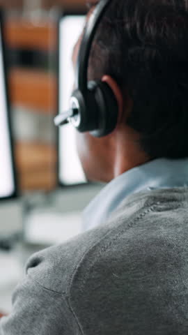 Call center, man and computer screen in office with help desk, communication and online consultant. Contact us, headset and technical service crm, discussion or sales agent back for advice hotline