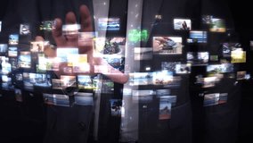 Businessman interacting with holographic image gallery using augmented reality interface - Powered by Shutterstock - Get 15% off with code: PIKWIZARD15