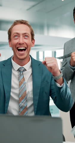 Man, laptop and high five with money rain in office, team and success with dividend results. People, goals and fist pump with cheers, win and bonus with profit on stock market at investment agency