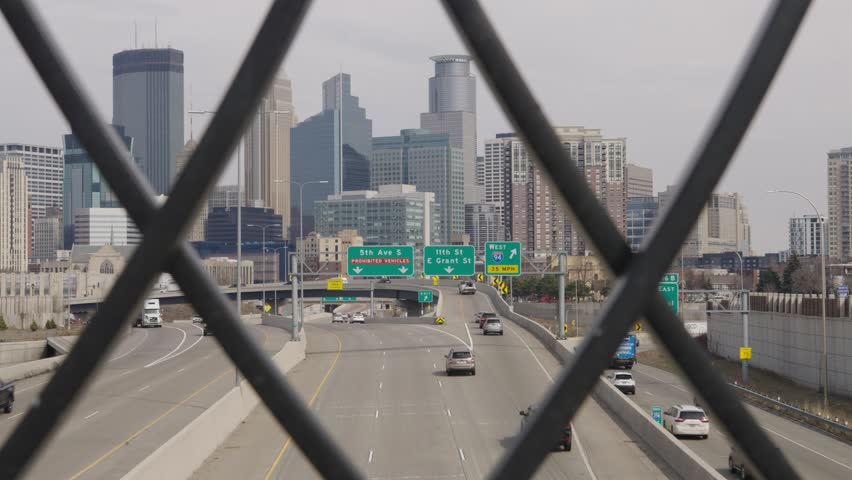Three-Way Lane Freeway Over Minneapolis Cityscape In Minnesota, United States. Static Shot