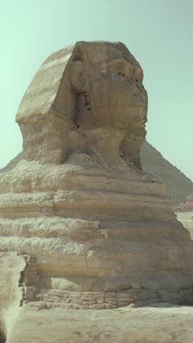 Great Sphinx of Giza, vertical video, memories of summer traveling to Egypt, tourist excursion to famous ancient landmark. Sightseeing and visiting popular tourist location in Africa, history, culture