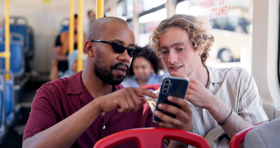 Men, friends and travel with phone on bus for communication, social media and public transport. People, laughing and mobile for reading funny blog, commute schedule and notification with chat update