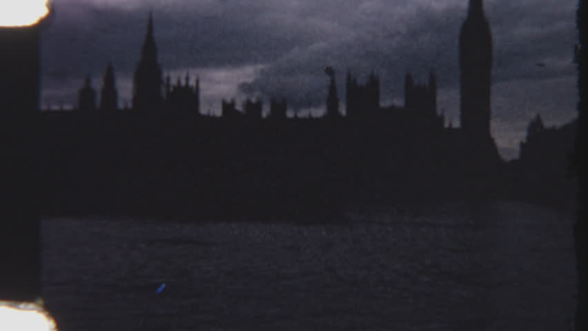 An authentic 8mm film clip captures the iconic Houses of Parliament silhouetted against a cloudy sky, with the River Thames in the foreground