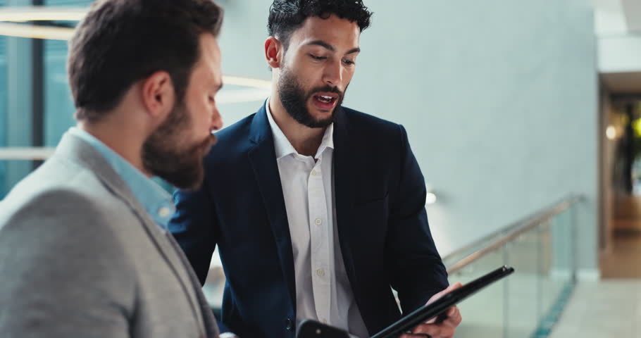 Discussion, business people and men with tablet in office, investment research or handshake in lobby. Teamwork, financial advisor or manager with digital for company growth, shaking hands or feedback