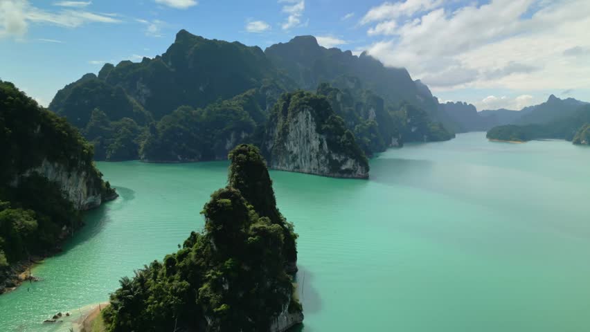 Cheow Lan Lake, Khao Sok National Park, Surat Thani Province, South of Thailand. Aerial view shows green mountain islands of Khao Sok National Park in Surat Thani, Thailand