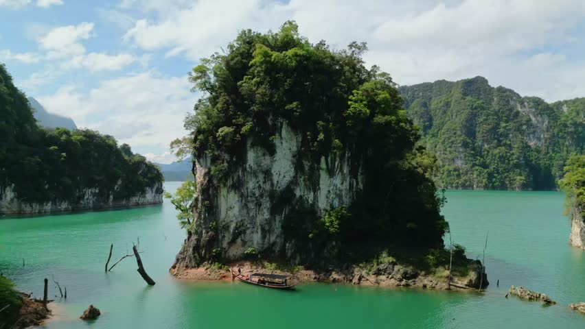 Cheow Lan Lake, Khao Sok National Park, Surat Thani Province, South of Thailand. Aerial view shows green mountain islands of Khao Sok National Park in Surat Thani, Thailand