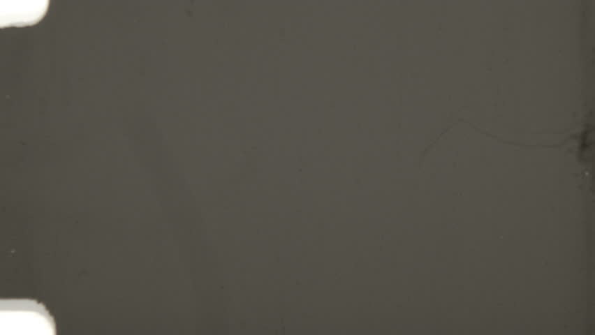 This authentic 8mm film overlay features subtle light grain texture, delicate dust particles, and the distinctive frame edges of 8mm film, with color gradient that transitions to brighter background