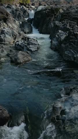 Rushing River Water Flows Through Rocky Gorge on Vancouver Island, British Columbia