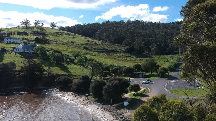 Tinderbox, Tasmania, Australia – Aerial Drone Footage Featuring Clear Waters, Rocky Reefs, Coastal Cliffs, Waterfront Homes, Boat Ramp, Tinderbox Marine Reserve, Bay, and Ocean Views

