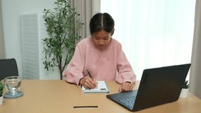 Asian girl diligently studies online and does homework during summer break - Powered by Shutterstock - Get 15% off with code: PIKWIZARD15