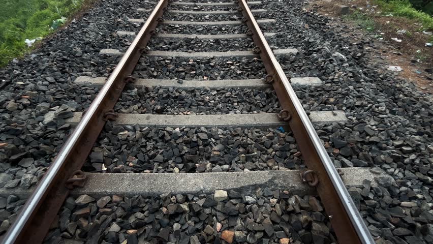 The train track went straight into the distance.