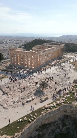 Aerial view of the Parthenon and Acropolis hill in historic center of Athens, Greece, with ancient ruins, panoramic cityscape and historic architecture
