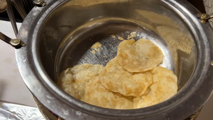 Maida puri served in Bengali wedding