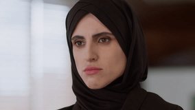 Upset islamic woman Muslim ethnic Islam girl in hijab Arabian worried sad eyes female businesswoman business portrait indoors arabic lady frustrated face looking at camera medical problem health care - Powered by Shutterstock - Get 15% off with code: PIKWIZARD15