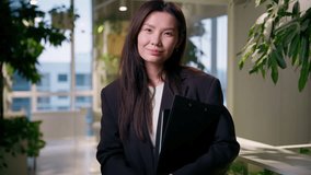 Portrait Asian business woman smiling girl entrepreneur leader in office company Chinese Korean Japanese female businesswoman employer manager professional worker broker architect looking at camera - Powered by Shutterstock - Get 15% off with code: PIKWIZARD15