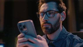 Caucasian man business entrepreneur manager at dark night evening office overtime working male guy concentrated businessman ceo trader browsing smartphone gadget addict insomnia typing mobile phone - Powered by Shutterstock - Get 15% off with code: PIKWIZARD15