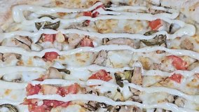 Jalapeno Chicken pizza with slices chicken pieces chunks, mozzarella cheese, olive oil, fresh herbs, chili pepper slices, tomato sauce, Italian cuisine pizza, selective focus - Powered by Shutterstock - Get 15% off with code: PIKWIZARD15