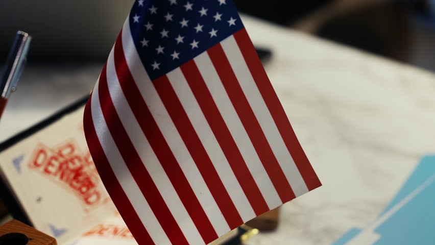 Multiple denied passport stamps at U.S. customs office, refusal of entry