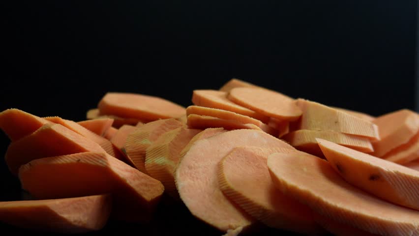Sweet Potato on Dark Black Background – Minimalist Organic Food Footage