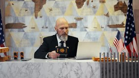 U.S. embassy officer checking Mexican passport data online, consular processing - Powered by Shutterstock - Get 15% off with code: PIKWIZARD15