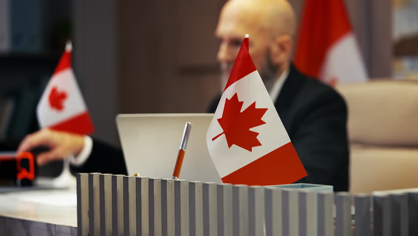 Canada customs officer stamps seal on citizenship application, official service