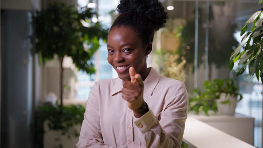 Thoughtful African American ethnic business woman student manager thinking businesswoman girl employer think ponder dream in office pointing finger inspiration create idea insight happy smile answer