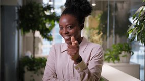 Thoughtful African American ethnic business woman student manager thinking businesswoman girl employer think ponder dream in office pointing finger inspiration create idea insight happy smile answer - Powered by Shutterstock - Get 15% off with code: PIKWIZARD15