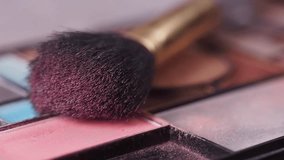 Demonstration of applying makeup using various colors and tools - Powered by Shutterstock - Get 15% off with code: PIKWIZARD15