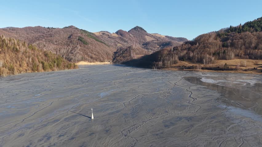 Drone scenic footage of the nature pollution and water contamination of the copper mine exploitation in Geamana, near Rosia Montana, Romania, Europe