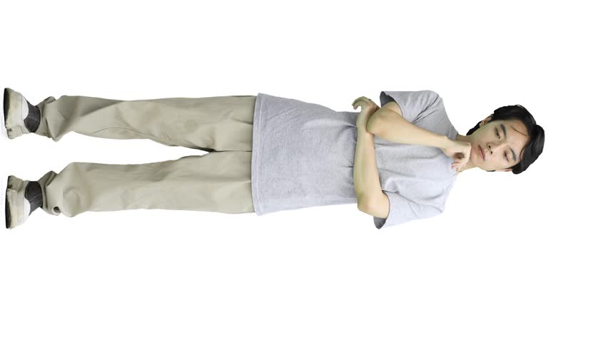 A guy in a gray T-shirt, on a white background, in full height, thinks