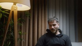 Man Holding Phone with Message This Could Change Everything in Cozy Indoor Setting, Inspiring and Intriguing Moment - Powered by Shutterstock - Get 15% off with code: PIKWIZARD15