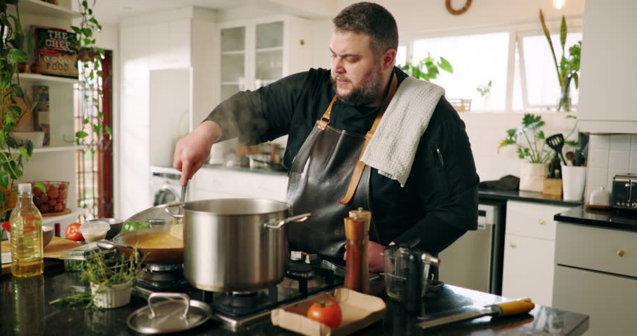 Man, chef and kitchen with stove for cooking, meal preparation or hospitality service at home. Male person, influencer or private cater with pot or stir for food, culinary skill or dinner at house