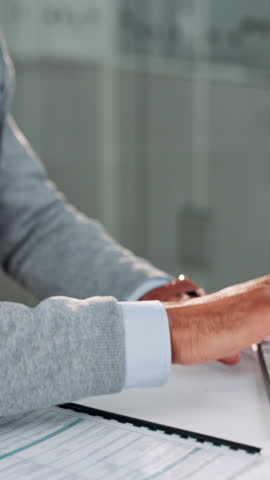 Business people, meeting and hiring with handshake for agreement, contract or employment at office desk. Closeup, colleagues or recruiter shaking hands with applicant for deal or recruiting process