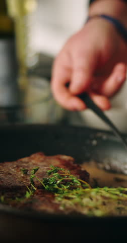 Recipe, hands and person with steak in frying pan for meal preparation, healthy ingredients and sear meat cuisine. Closeup, chef and cooking beef food with thyme for nutrition, protein diet or dinner