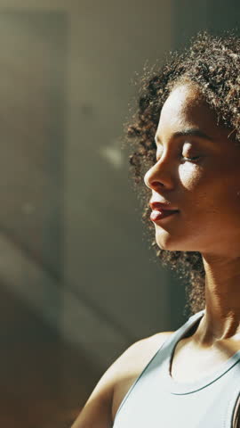 Breathing, meditation and woman in lotus pose in home for relax, zen or mental health in living room. Calm, peace and female person with yoga for mindfulness, energy or spiritual growth in house.