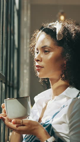 Happy, window and woman with coffee in home for thinking, daydreaming and inspiration. Morning, relax and African person smile with beverage, hot drink and tea in house for calm, peace and wellness