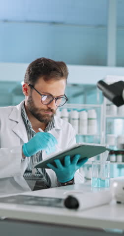 Tablet, scientist and man with test for medical experiment, results and chemistry innovation. Science research, pen and digital technology for medicine development, pharma and healthcare study in lab